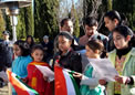 Children singing patriotic songs after flag hoisting on Independence Day at HCI on 15 Aug 2008