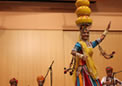 An artist of Rajasthani Group dancing with seven pots on her head at Canberra on 06 Nov 2010