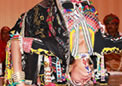 An Artist of Rajasthani Cultural Group picking up the rings by her eye lids during performance at Canberra on 06 Nov 10