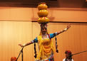 An Artist of Rajasthani Cultural Group dancing with three pots on her head at Canberra on 06 Nov 2010