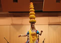 An artist of Rajasthani Cultural Group dancing on sharp edges of swords with seven pots on her head at Canberra on 06 No